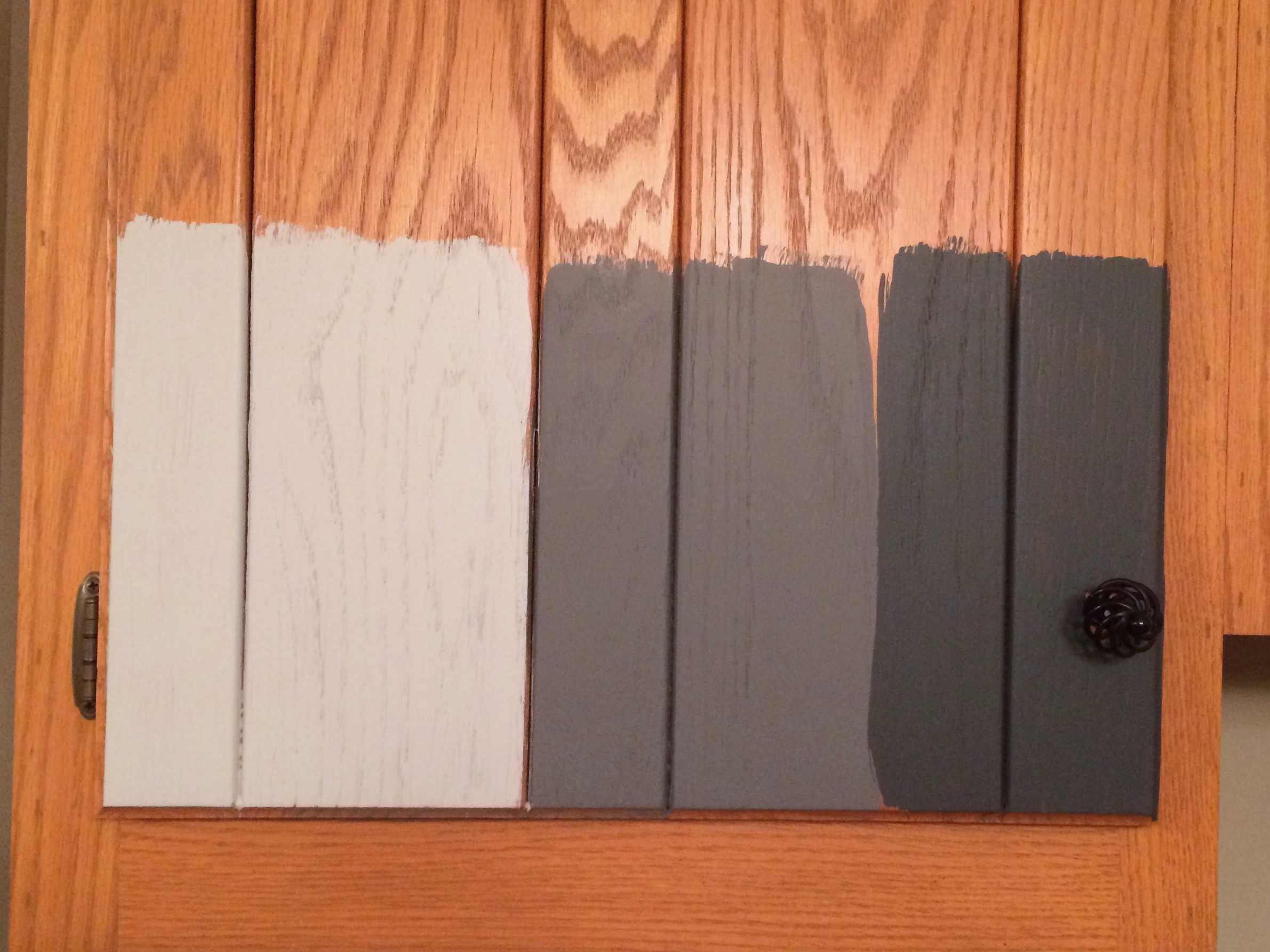 how to paint kitchen cabinets without sanding or priming- paint samples on outdated oak cabinets by Tasha Agruso of Gadgetronicx