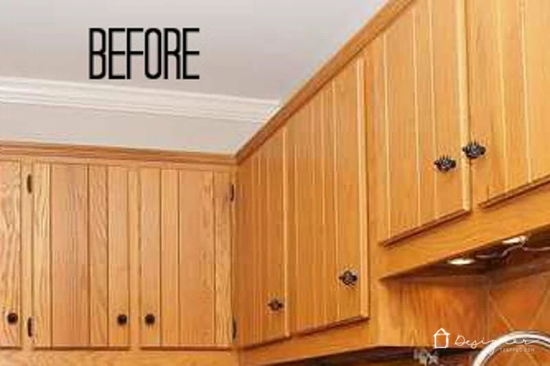 how to paint kitchen cabinets without sanding or priming- before photo of outdated oak cabinets by Tasha Agruso of Gadgetronicx