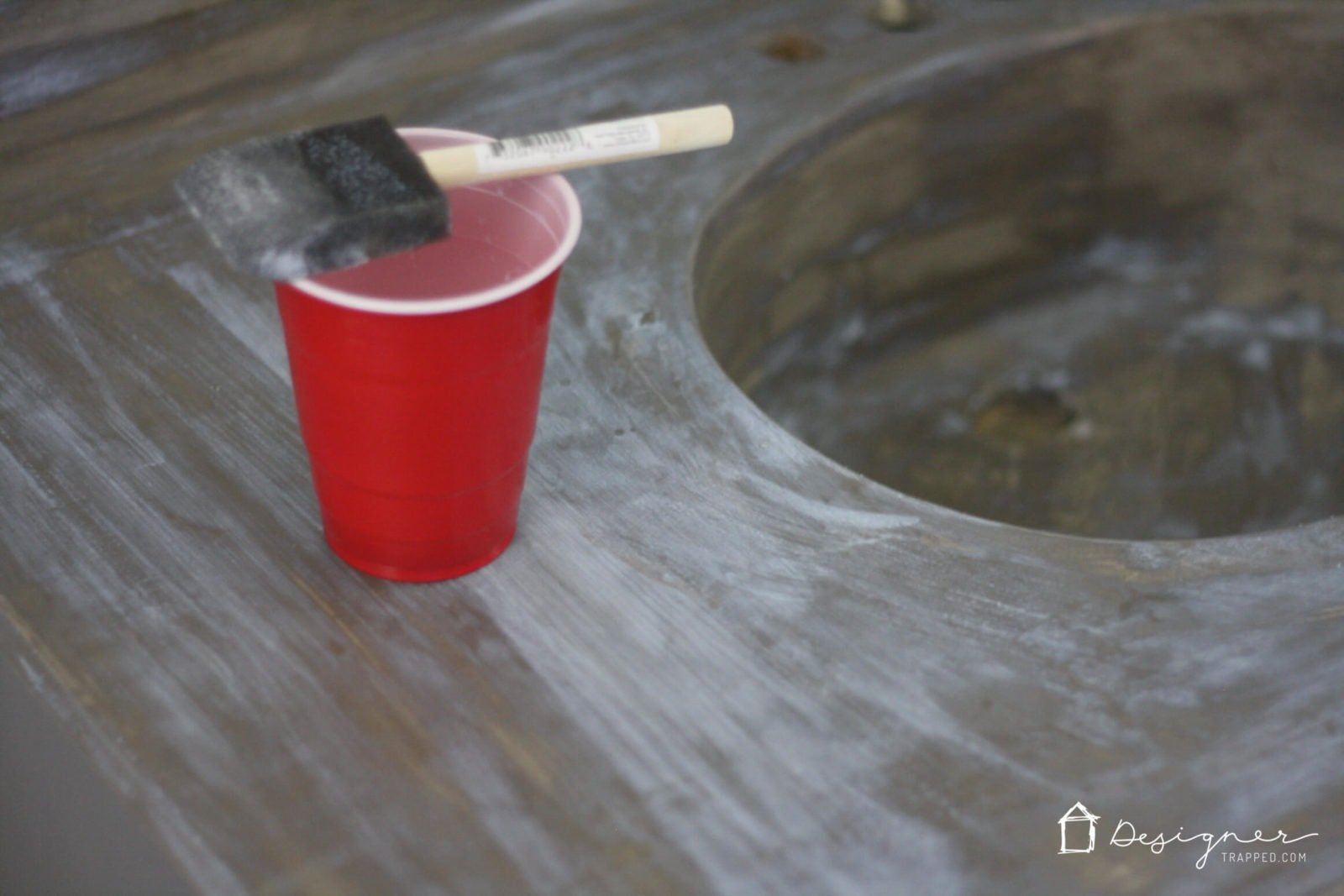 You can update your bathroom vanity without spending a fortune! This DIY vanity update using a concrete overlay with Ardex Feather Finish can be done for around $50 (including a new faucet). Check out the full tutorial!