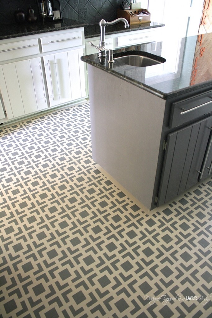 AMAZING! Do you have badly damaged wood floors that you can afford to refinish? This is a great option! Love the look of these stenciled floors! Check out the full tutorial by Designer Trapped in a Lawyer's Body.