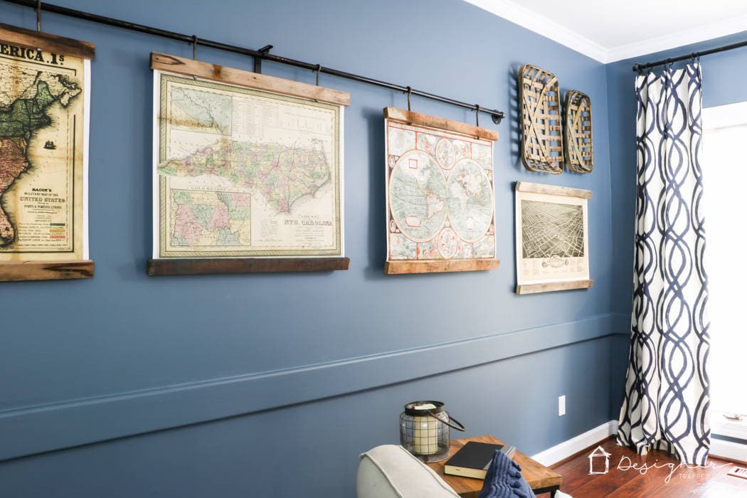 Philipsburg Blue by Benjamin Moore on the family room wall of Tasha Agruso of Gadgetronicx. Ancient maps on an industrial pole decorate the wall. 