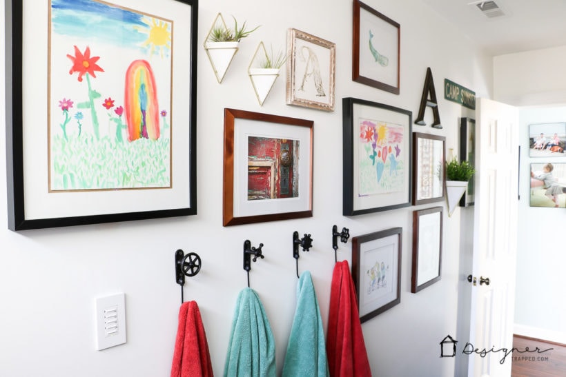 WOW, WOW, WOW! This DIY bathroom remodel is by far one of the best I have seen, and they REALLY did all the work themselves! I love the floor to ceiling subway tile, the black slate tile floor and the penny tile accents. And that floating vanity is amazing.