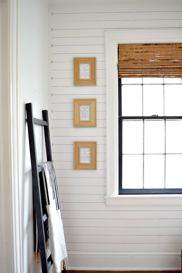 neutral hallway with blanket ladder