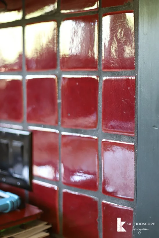 glossy red ceramic backsplash before painting tile backsplash