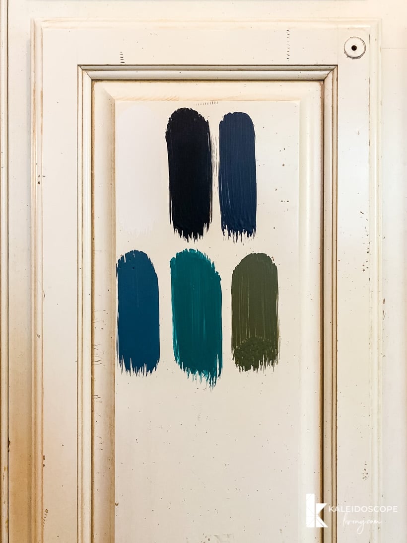 paint samples on cabinet