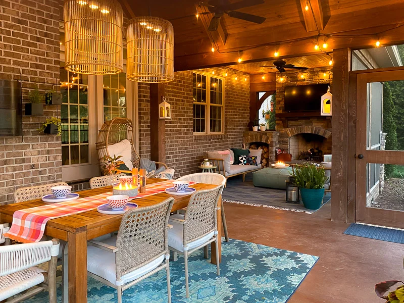 screened-in-porch with string lights lit up in the evening