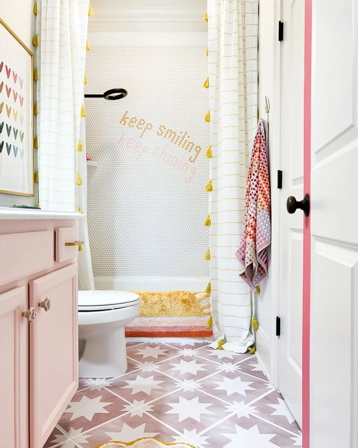 tile stickers used to update floor in girl's bathroom by Tasha Agruso of Gadgetronicx